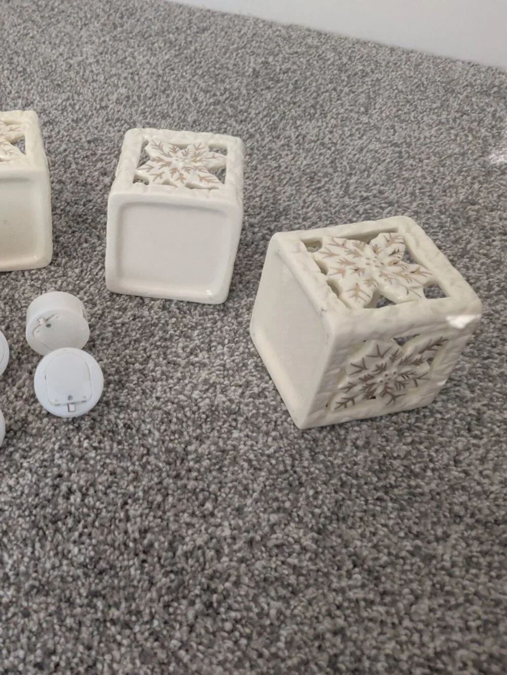 Set of 4 Cream Ceramic Pierced Poinsettia Tea Light Lanterns + 4 LED Candles
